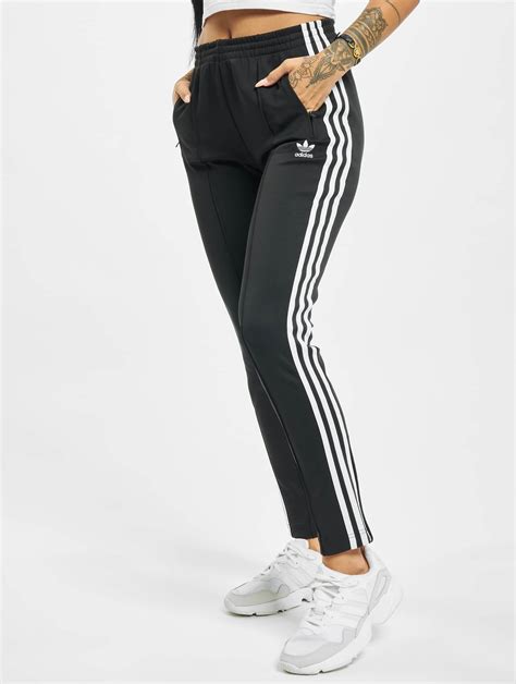 adidas jogginganzug damen schwarz weiss|Adidas Damen Jogginghosen online kaufen .